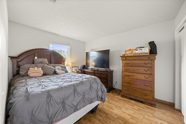 bedroom featuring light hardwood / wood-style floors