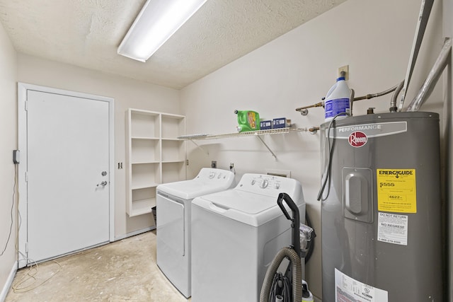 laundry room with separate washer and dryer, water heater, and a textured ceiling