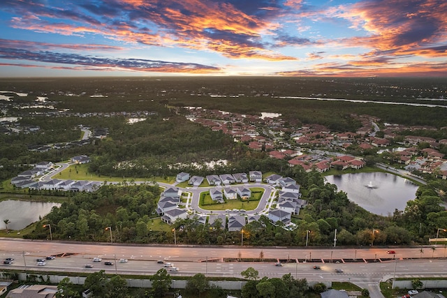 200 SW Pomeroy St, Stuart, FL 34997 - aerial view at dusk of a water view and a residential view