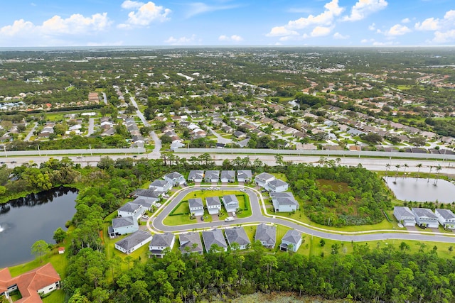200 SW Pomeroy St, Stuart, FL 34997 - aerial overview of property's location with a large body of water and nearby suburban area