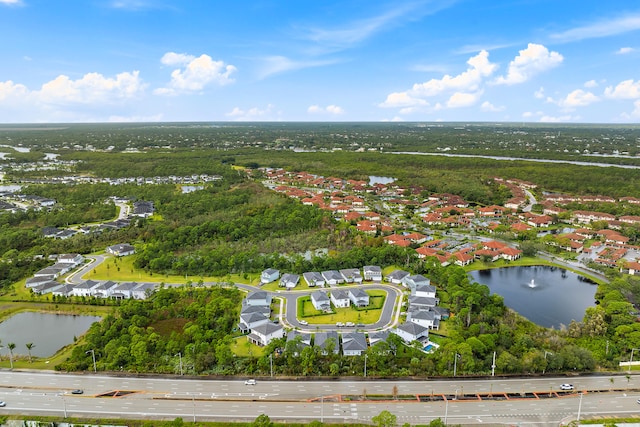 drone / aerial view featuring a water view