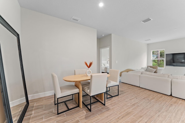 dining area featuring light hardwood / wood-style floors