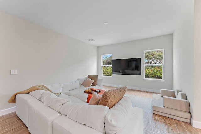 200 SW Pomeroy St, Stuart, FL 34997 - living room with light wood-type flooring and baseboards