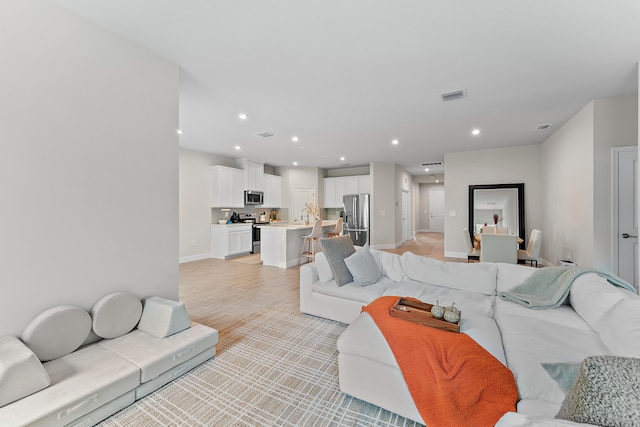 living room featuring light hardwood / wood-style flooring