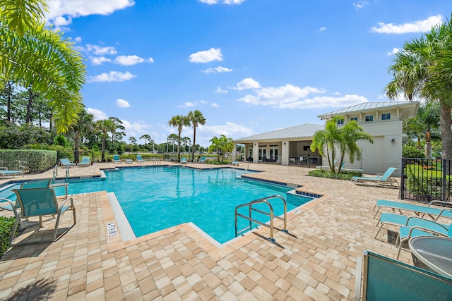 view of pool featuring a patio area