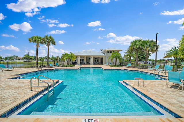 200 SW Pomeroy St, Stuart, FL 34997 - community pool featuring a patio