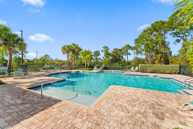 view of pool with a patio