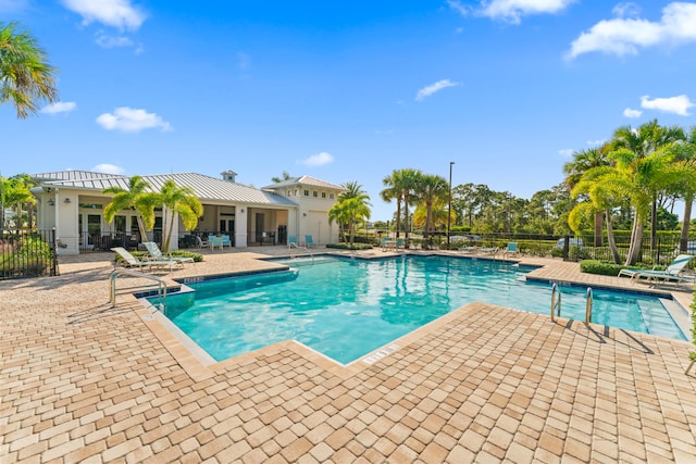 view of pool featuring a patio area