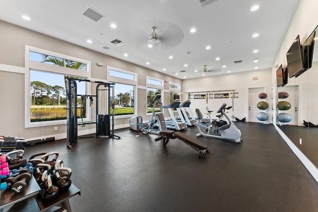 gym featuring plenty of natural light and ceiling fan