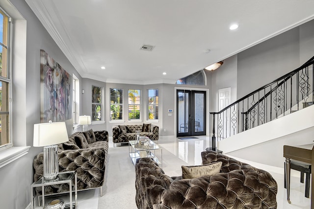 living room with french doors and crown molding