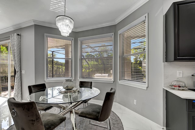 tiled dining area with ornamental molding, plenty of natural light, and a chandelier