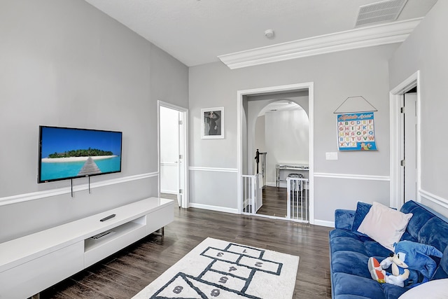 living room featuring dark wood-type flooring