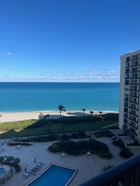 property view of water featuring a beach view