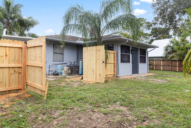 view of outdoor structure with a lawn