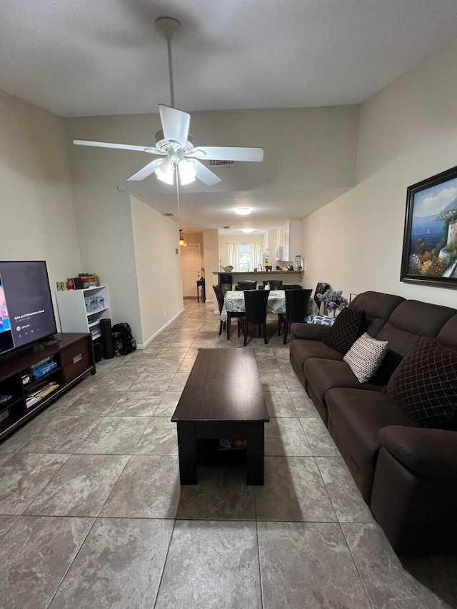 living room with ceiling fan