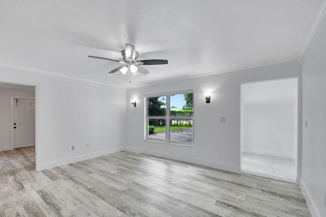 unfurnished room with ceiling fan, light hardwood / wood-style flooring, and ornamental molding