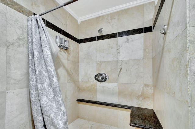 bathroom featuring ornamental molding and curtained shower