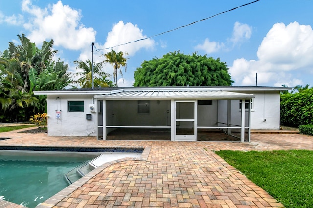 back of house featuring a patio