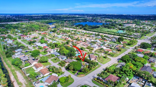 drone / aerial view featuring a water view