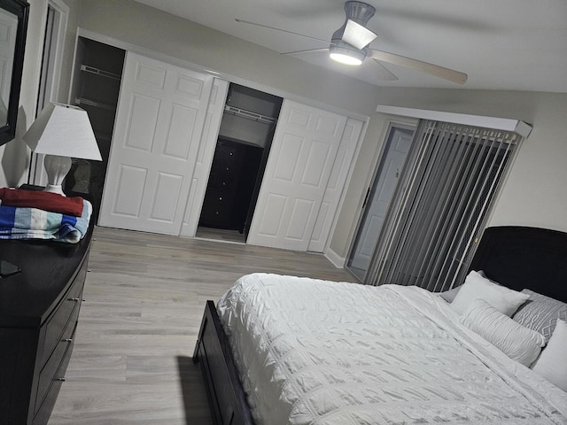 bedroom featuring light wood-type flooring, a ceiling fan, and a closet