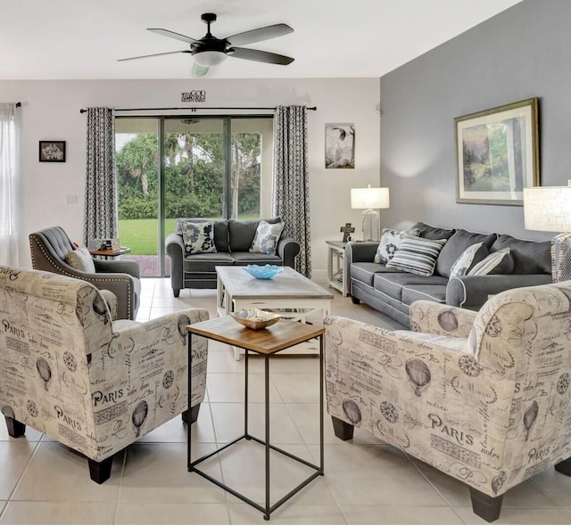 tiled living room featuring ceiling fan