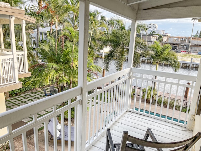 balcony featuring a water view