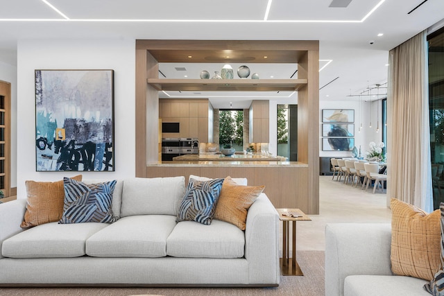 living room with light colored carpet