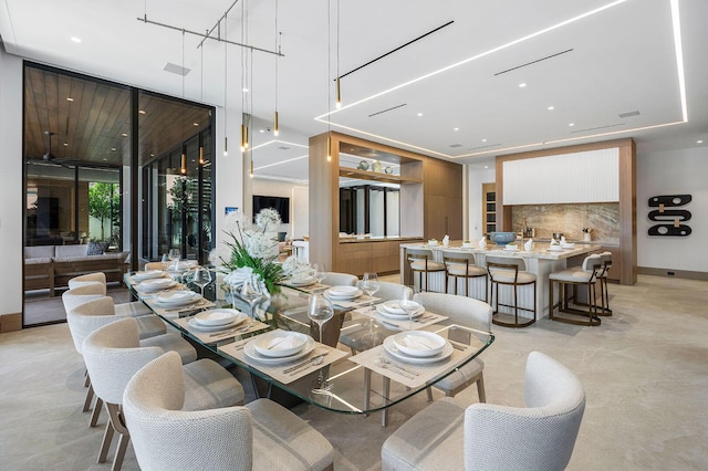 1520 Royal Palm Way, Boca Raton, FL 33432 - dining area with recessed lighting, baseboards, and concrete flooring