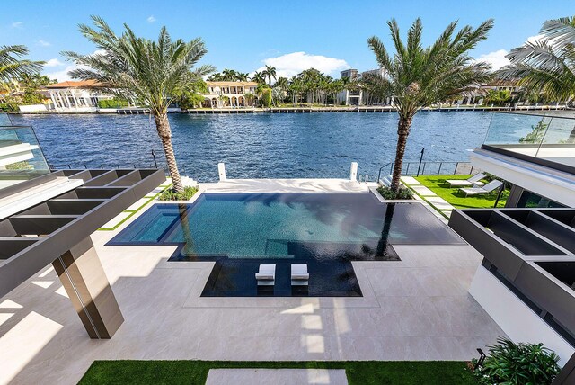1520 Royal Palm Way, Boca Raton, FL 33432 - view of swimming pool with a dock and a water view