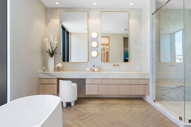 bathroom featuring vanity, independent shower and bath, and parquet floors