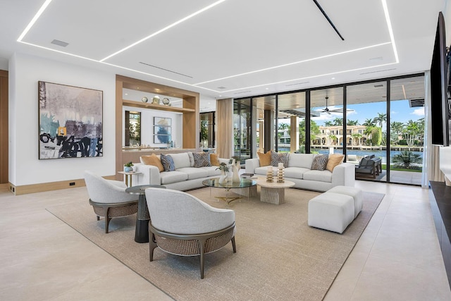 1520 Royal Palm Way, Boca Raton, FL 33432 - tiled living room with expansive windows and ceiling fan