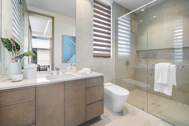 bathroom featuring walk in shower, vanity, and toilet