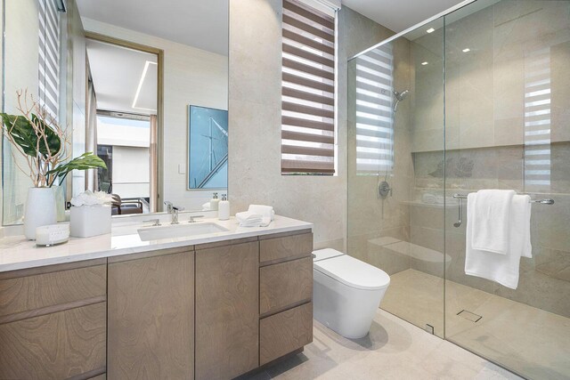 1520 Royal Palm Way, Boca Raton, FL 33432 - full bathroom featuring a stall shower, toilet, vanity, and tile patterned flooring
