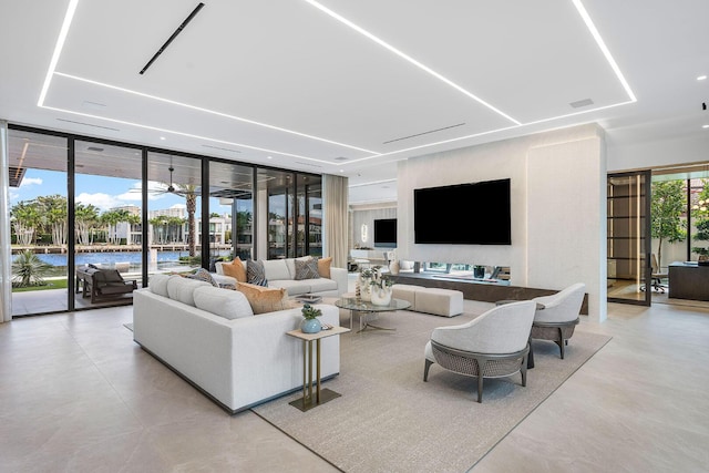 1520 Royal Palm Way, Boca Raton, FL 33432 - living area with concrete flooring and a wall of windows