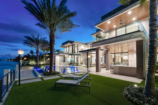 1520 Royal Palm Way, Boca Raton, FL 33432 - back of property with a balcony, a ceiling fan, a yard, and a patio area