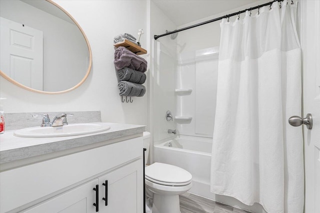 full bathroom with toilet, vanity, shower / bath combo with shower curtain, and hardwood / wood-style floors