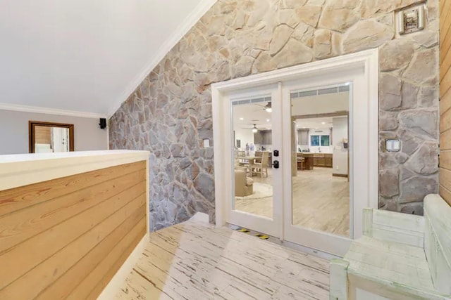 bathroom with hardwood / wood-style floors, french doors, and ornamental molding