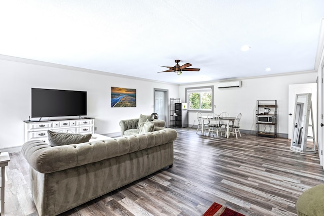 living room featuring wood-type flooring, an AC wall unit, and ornamental molding