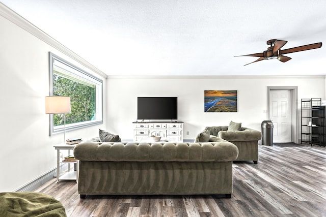 living room featuring dark hardwood / wood-style flooring, ornamental molding, a textured ceiling, and ceiling fan