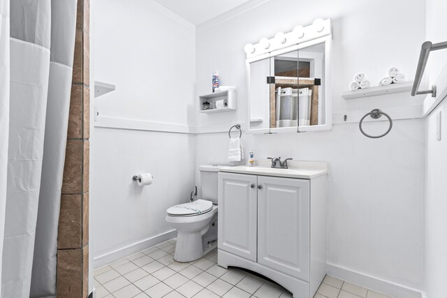 12151 Old Indiantown Rd, Jupiter, FL 33478 - bathroom with tile patterned floors, crown molding, vanity, toilet, and baseboards