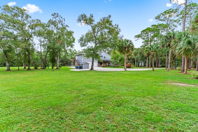 view of yard with a garage