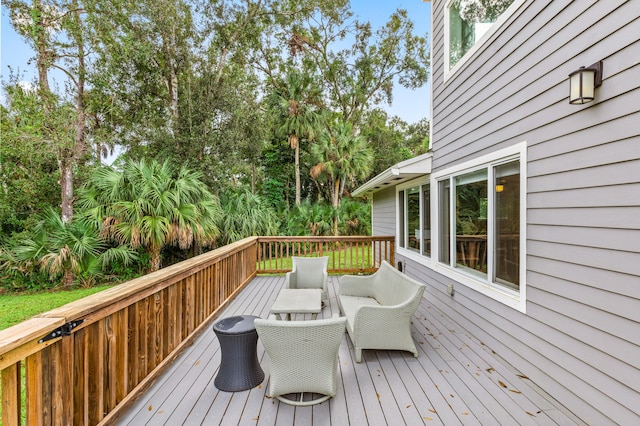 12151 Old Indiantown Rd, Jupiter, FL 33478 - wooden terrace featuring view of scattered trees and outdoor lounge area