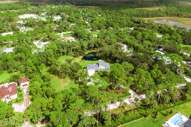 12151 Old Indiantown Rd, Jupiter, FL 33478 - drone / aerial view of a heavily wooded area and a nearby body of water