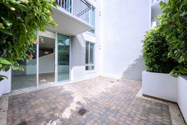 view of patio with a balcony