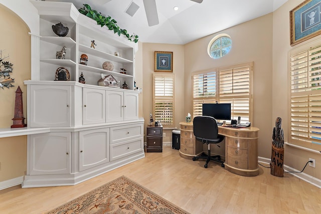 office area featuring vaulted ceiling, light hardwood / wood-style flooring, and ceiling fan