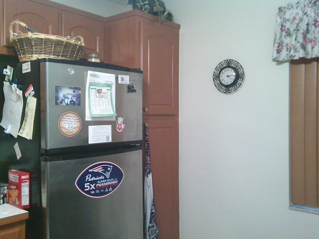 interior details with stainless steel refrigerator