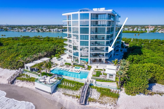 birds eye view of property featuring a water view