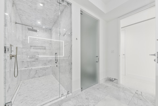 bathroom featuring walk in shower