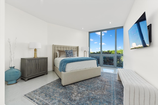 bedroom with a wall of windows