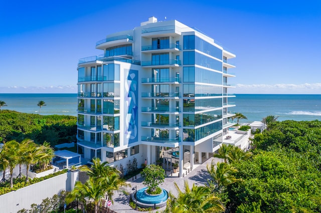 view of building exterior with a water view